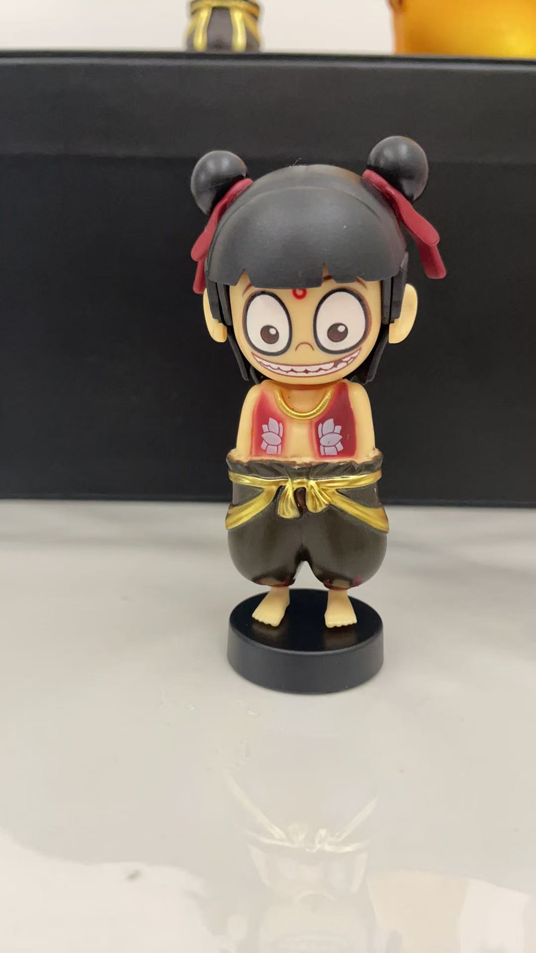 哪吒表情包变脸玩具魔童闹海按压变脸钥匙扣手机车载摆件饰品