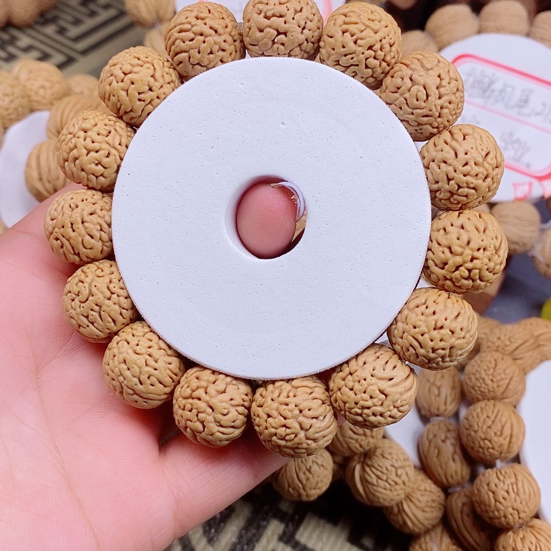 桃核手串凌***。野生小龙鳞1.7/1.8