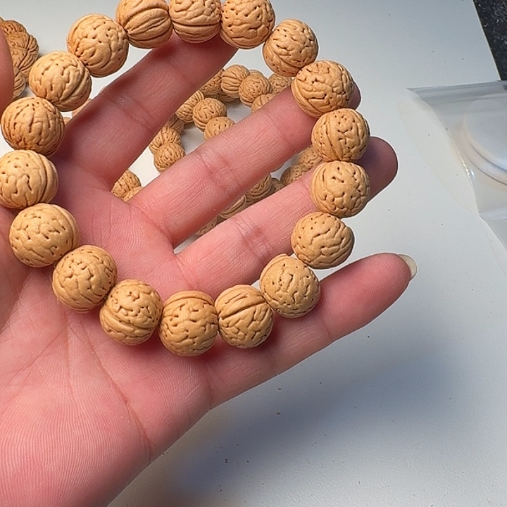 桃核吊坠金丹桃核手串