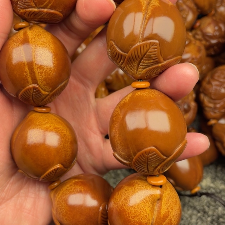 橄榄核吊坠尹***动橄榄核