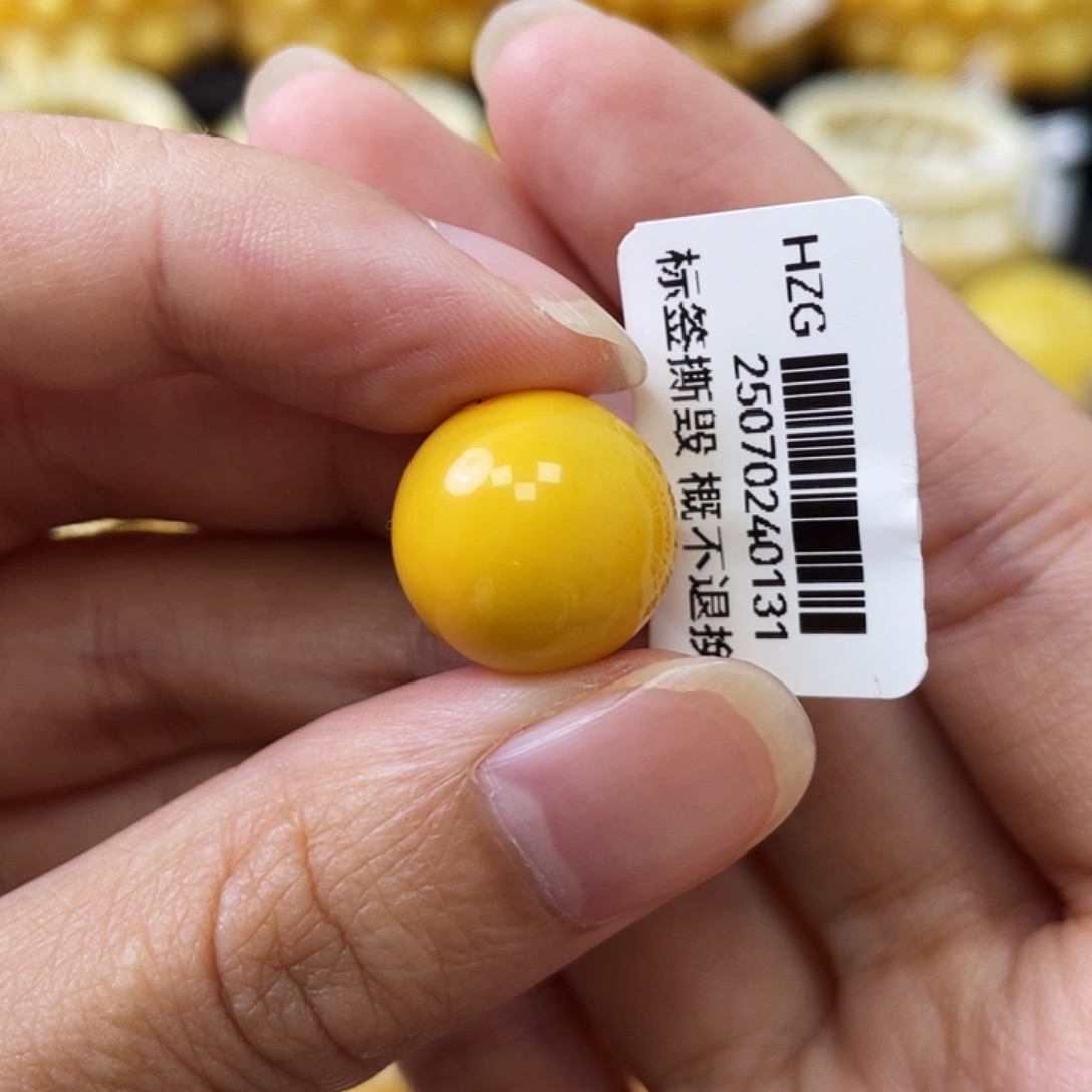 蜜蜡未镶嵌珠宝奇石鸡油黄妖花14.7mm微瑕