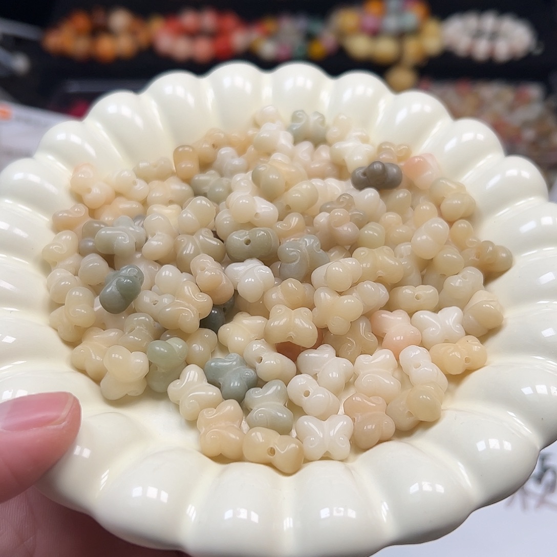 菩提根/象牙果手串30颗多宝色蝴蝶瑕