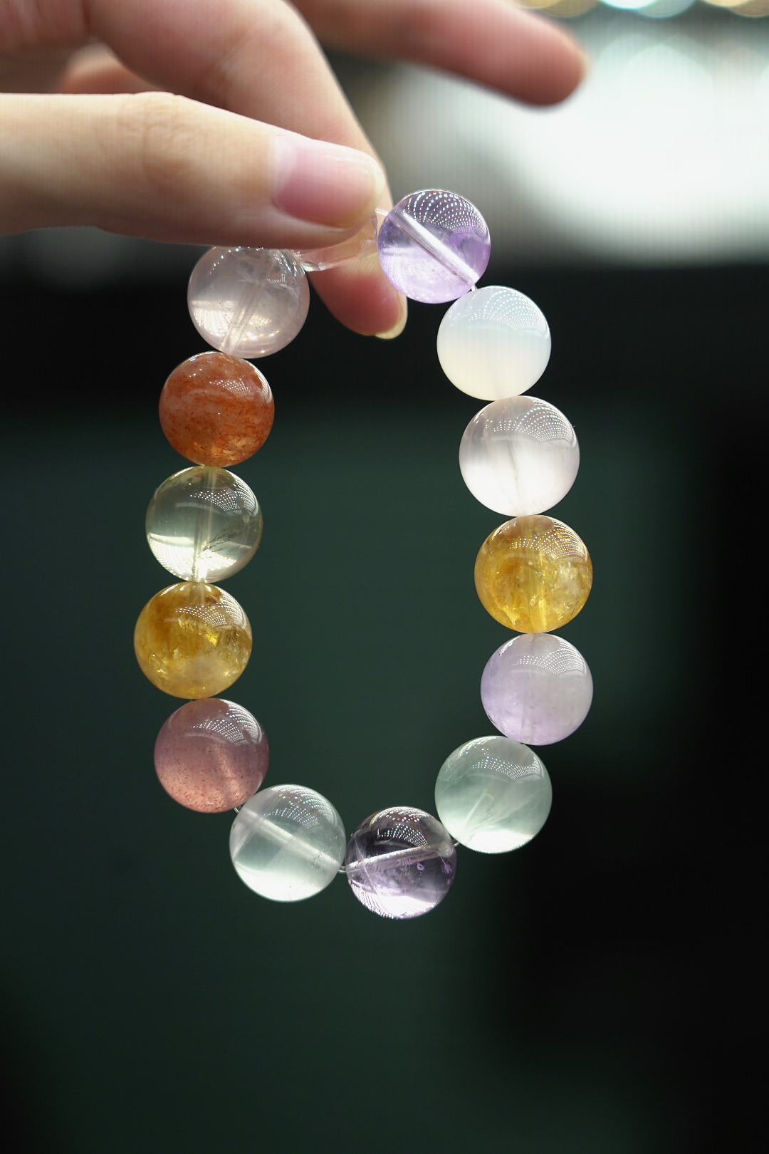 粉海星芒多宝水晶手串