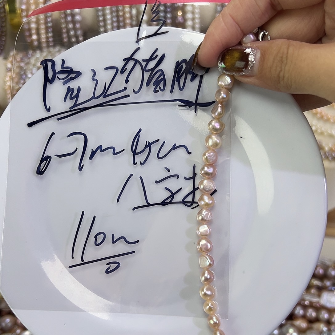 隆***》手绳淡水珍珠钛钢