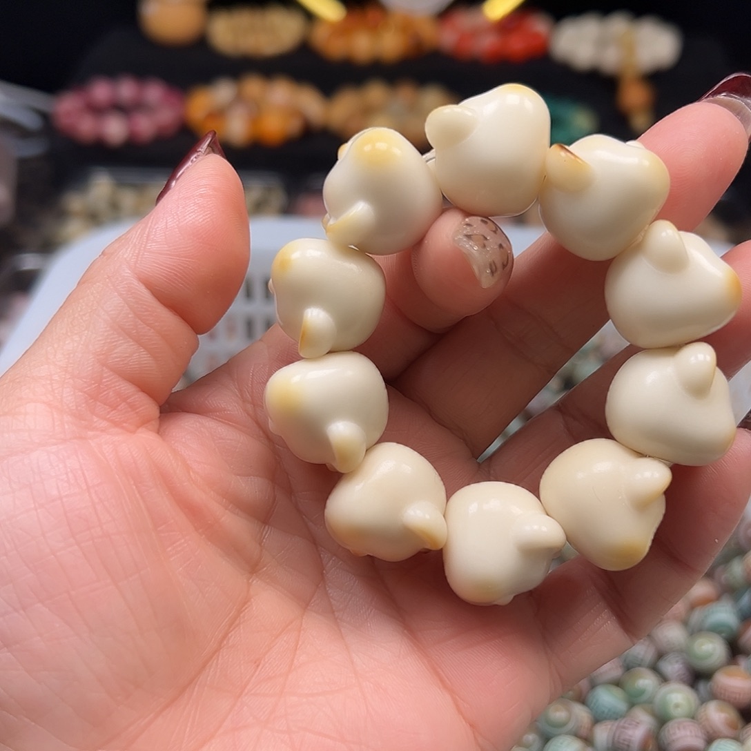 肆***玺手串菩提根/象牙果瑕疵10颗熊头