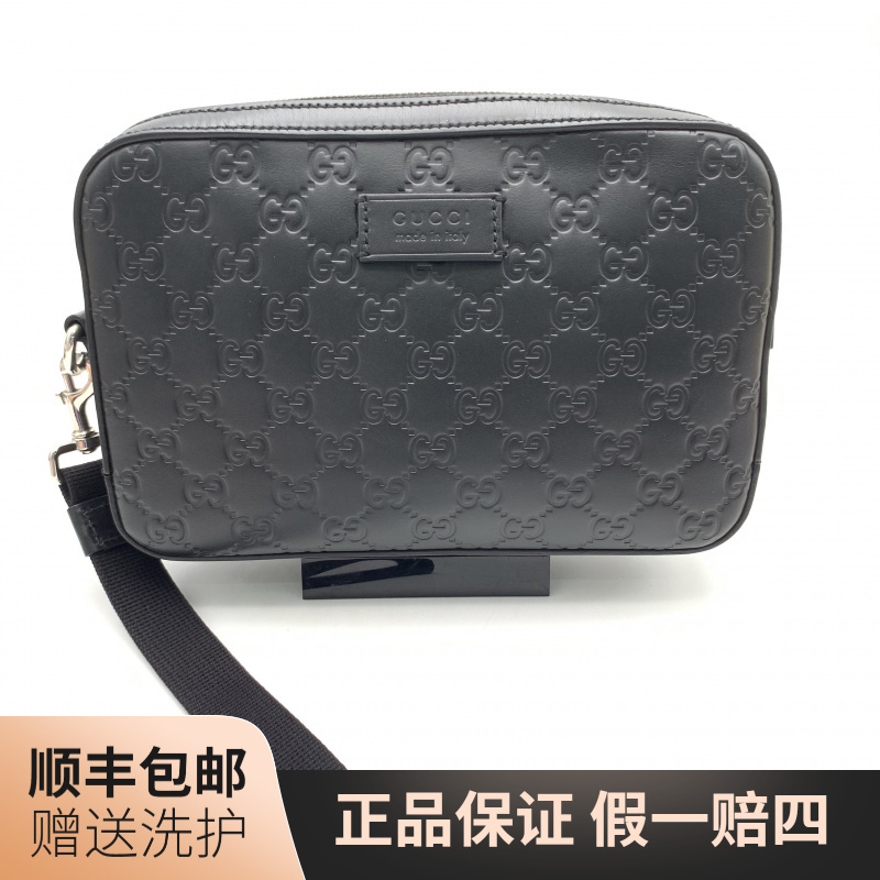 95新 GUCCI/古驰 古驰黑老花压印手拿包/J12097经典男士时尚 休闲