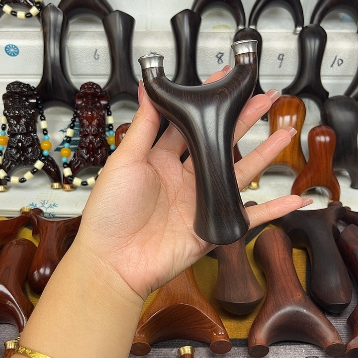 木乌木快压断臂飞虎。