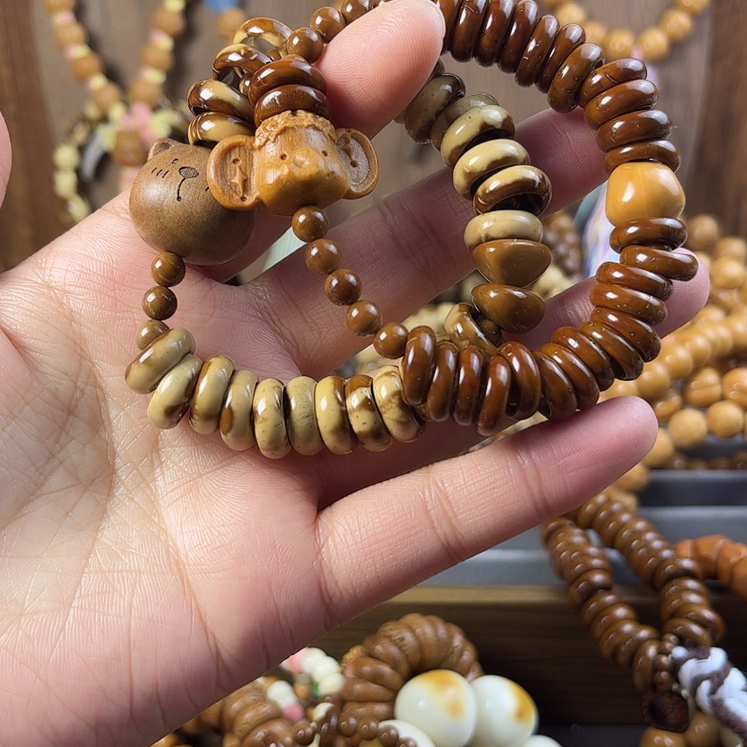 嘻***嘻吊坠紫金鼠紫金鼠手串手持碗肠标题