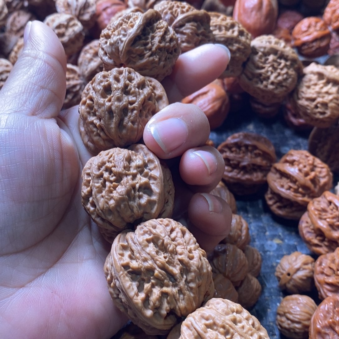 T***下文玩核桃吊坠雨花石