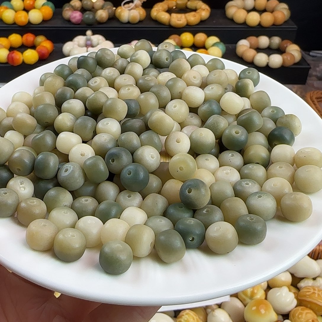 菩提根/象牙果吊坠瑕疵卡10绿飘花桶500颗会有孔道不通