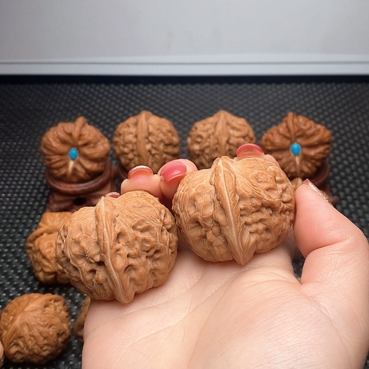 文玩核桃把件阿*。元宝