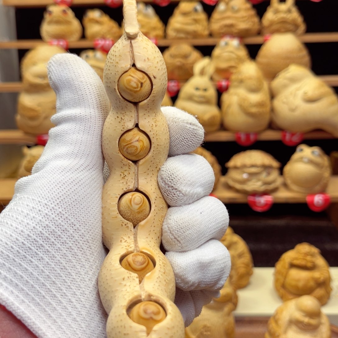 香榧木竹根雕福豆手把件