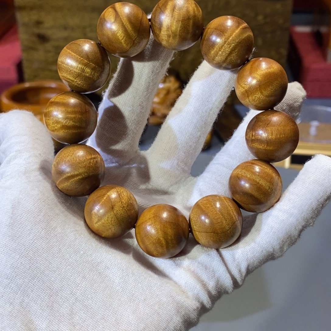 汾***村楠木金丝楠木小叶水波纹手串2.0