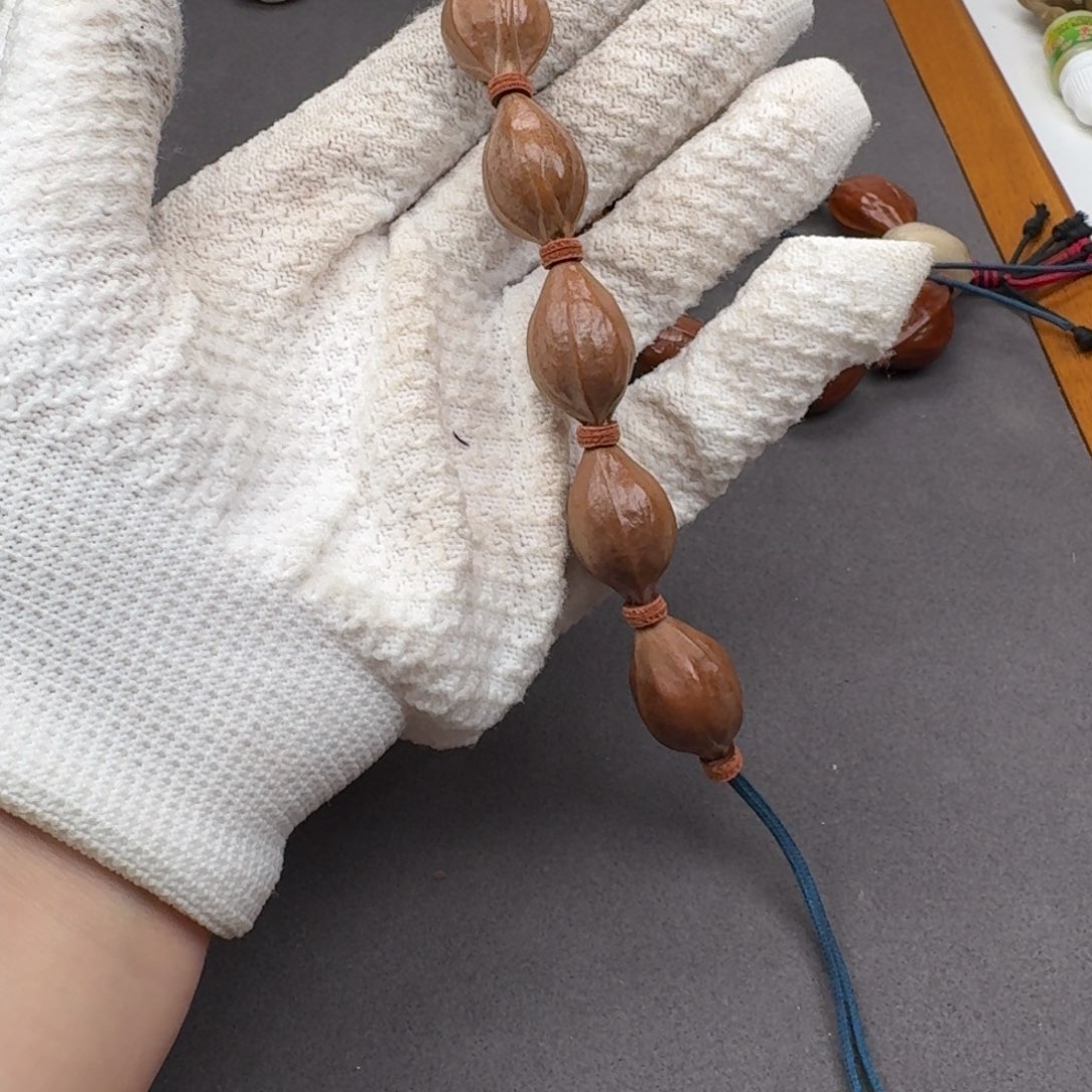 16*26三面佛梅林铁核手串