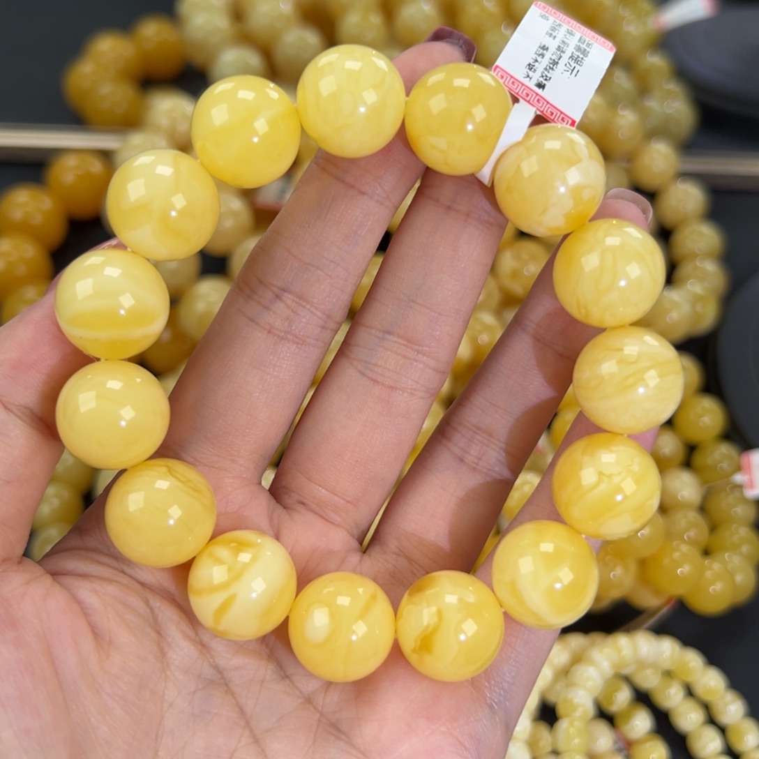 琥珀未镶嵌手链32.7黄白妖花