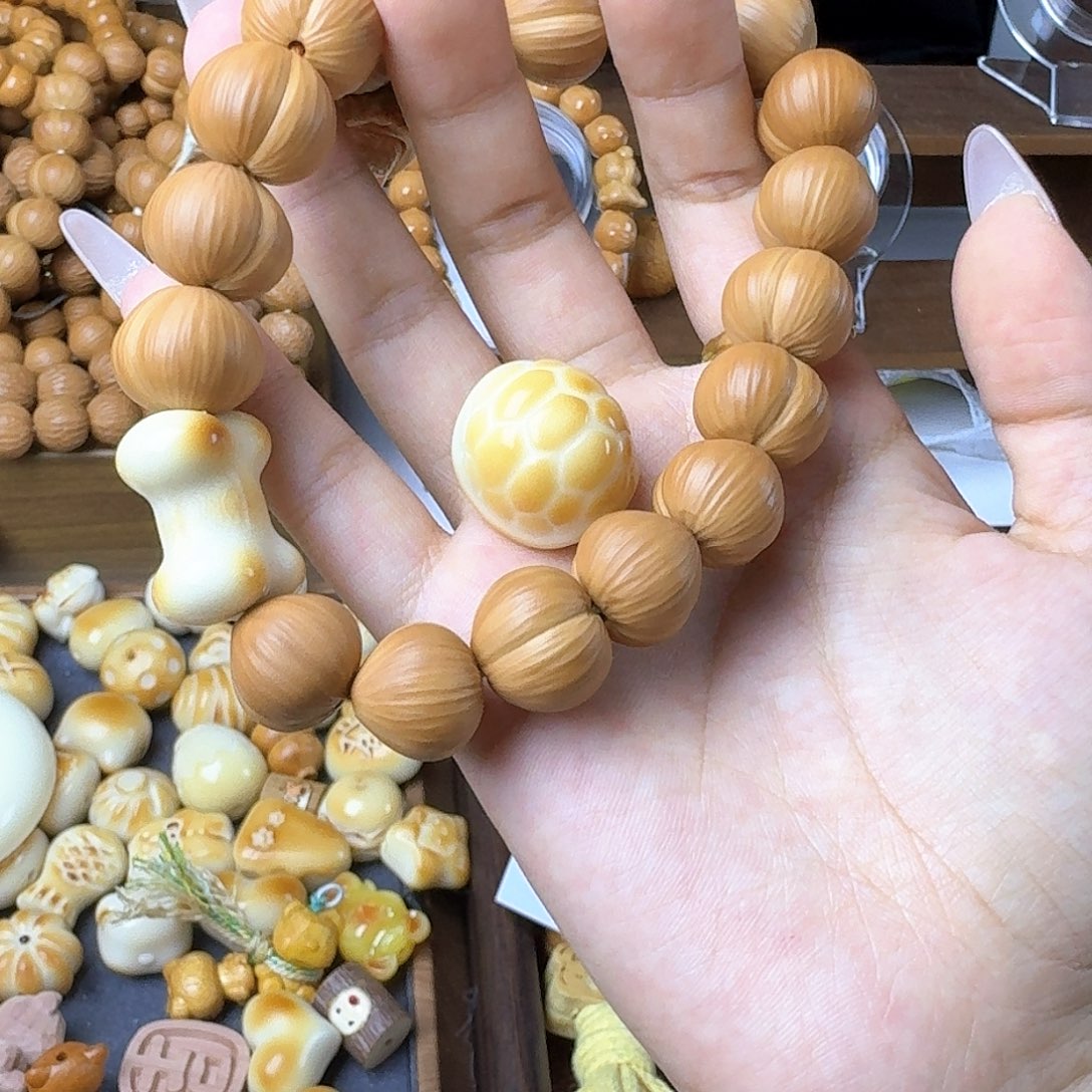 茉***茶吊坠猴头核桃拉丝