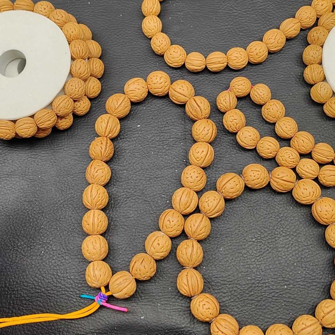 董***杰桃核吊坠10尺小金豆