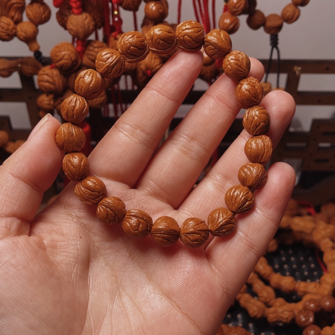 木质类龙纹桃枭手串