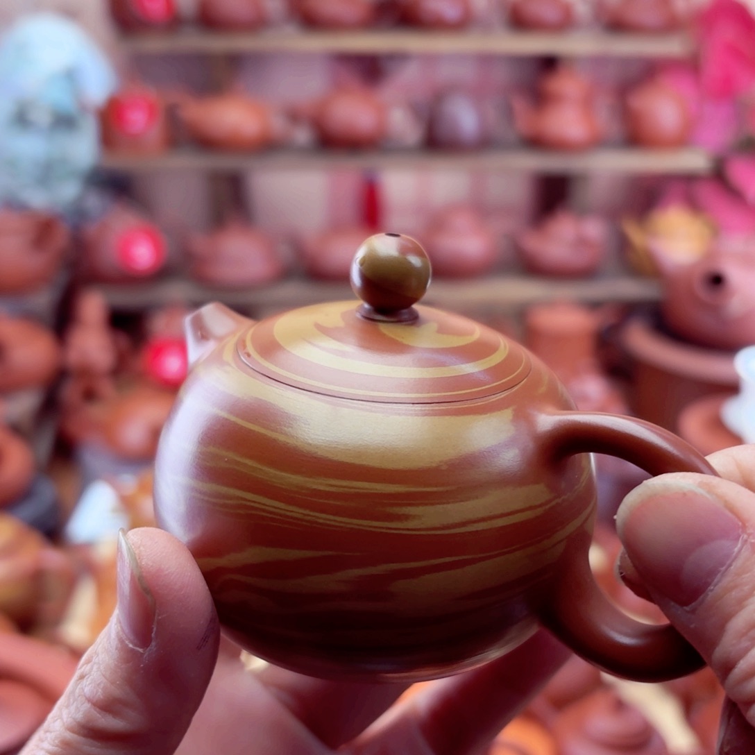 紫砂茶壶?****?西施110 cc手拉搅泥