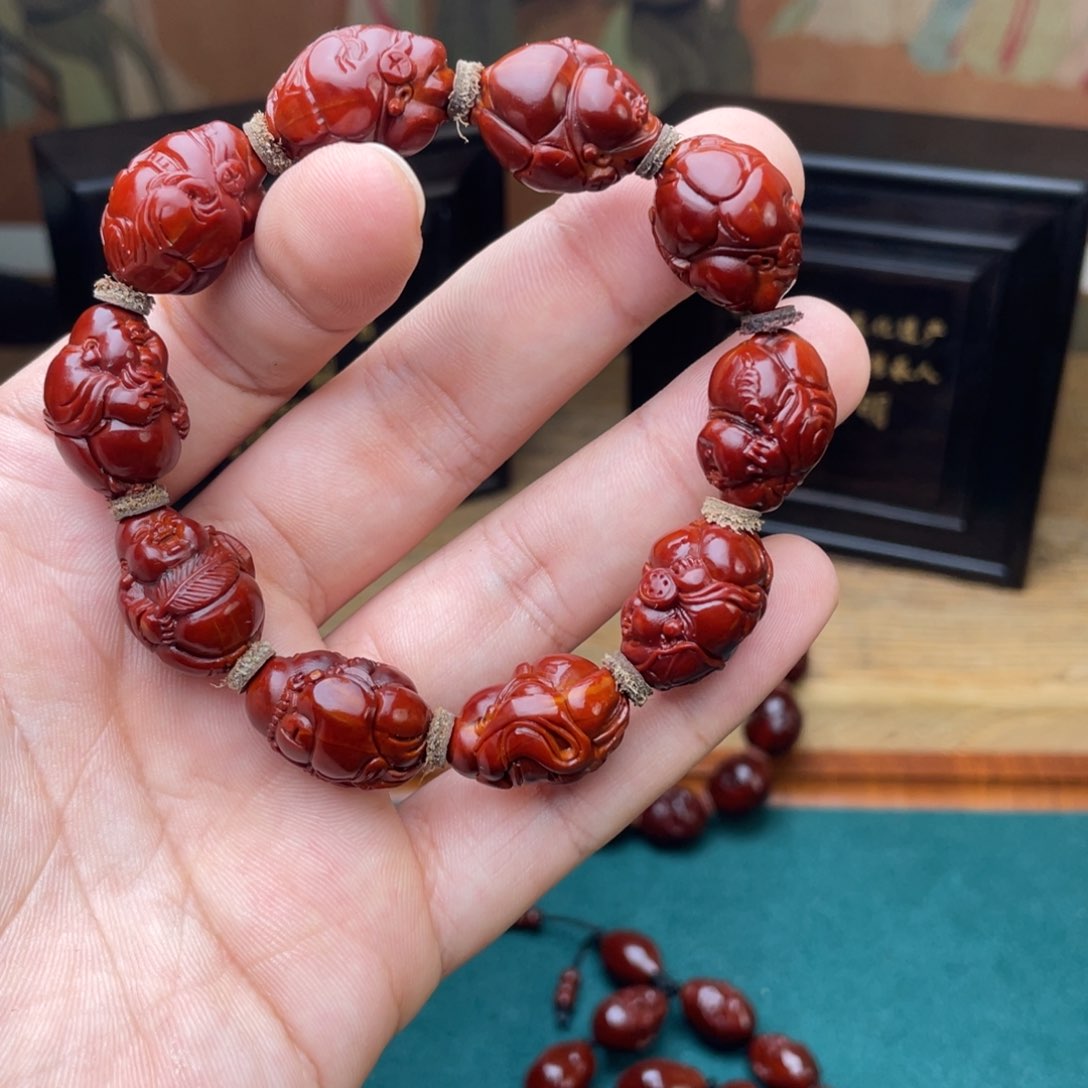 橄榄核手串谜****9财迷表弟回血