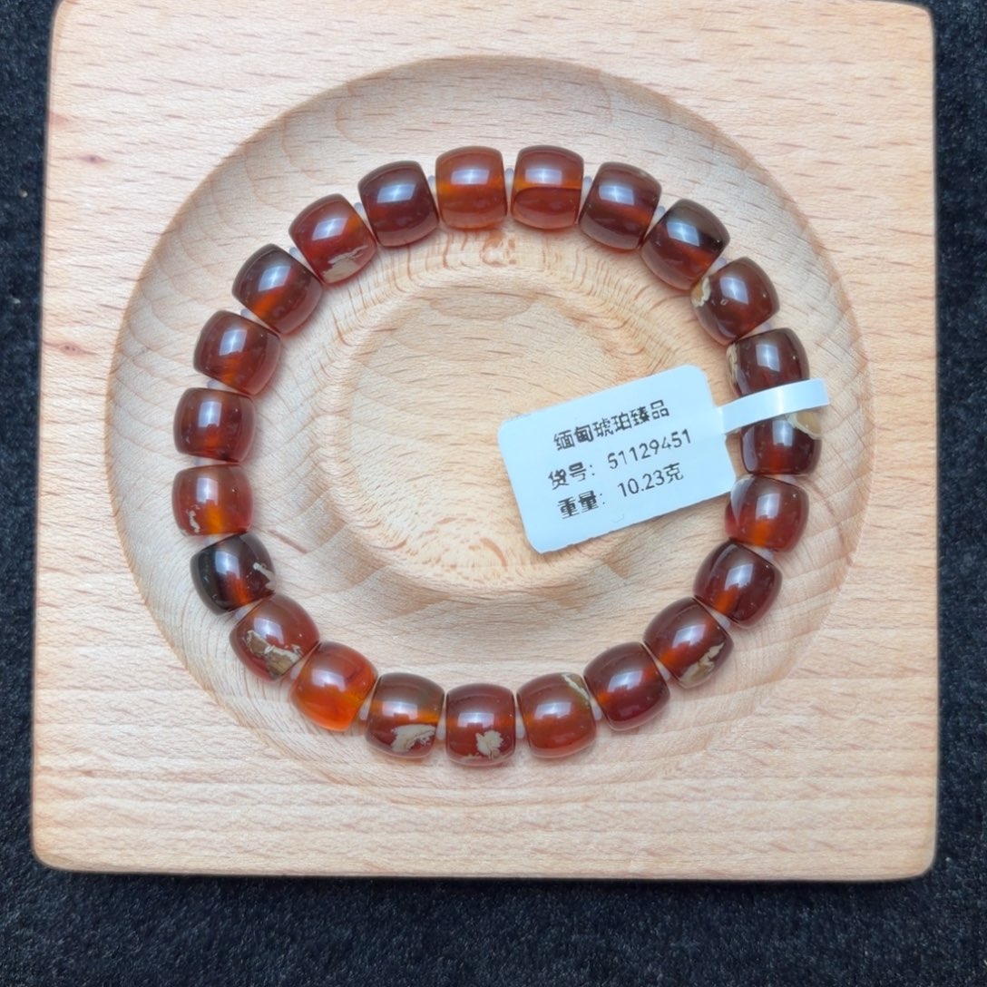 琥珀未镶嵌珠宝奇石9mm橘红蜜油根飘花直切