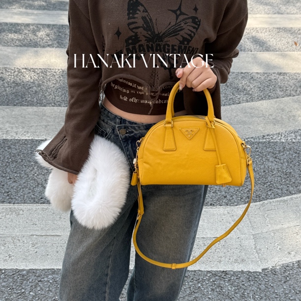 95新 Prada/普拉达 花绮中古/Prada黄色贝壳plume单肩包