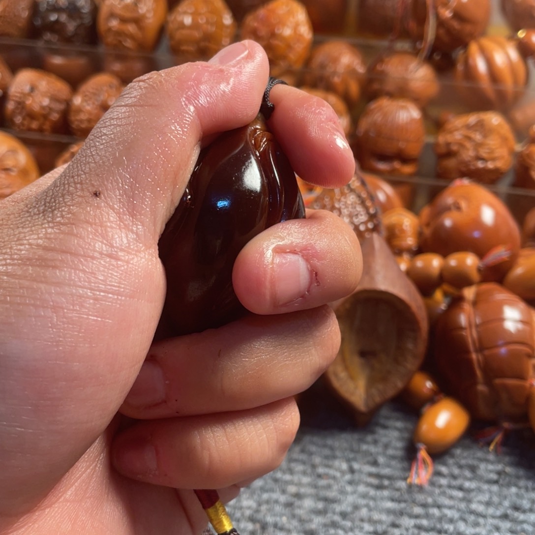 橄榄核吊坠玉华蝴蝶