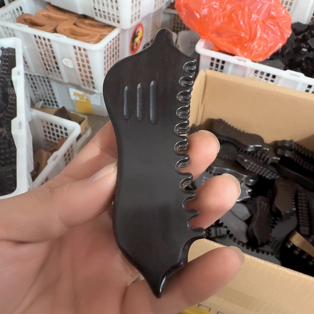 紫光檀中号三排脸梳微瑕