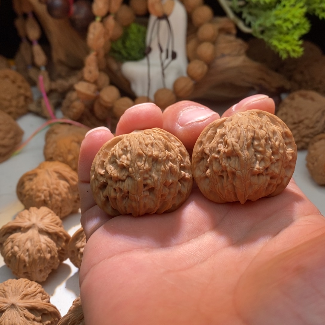 石***红文玩核桃把件磨盘40