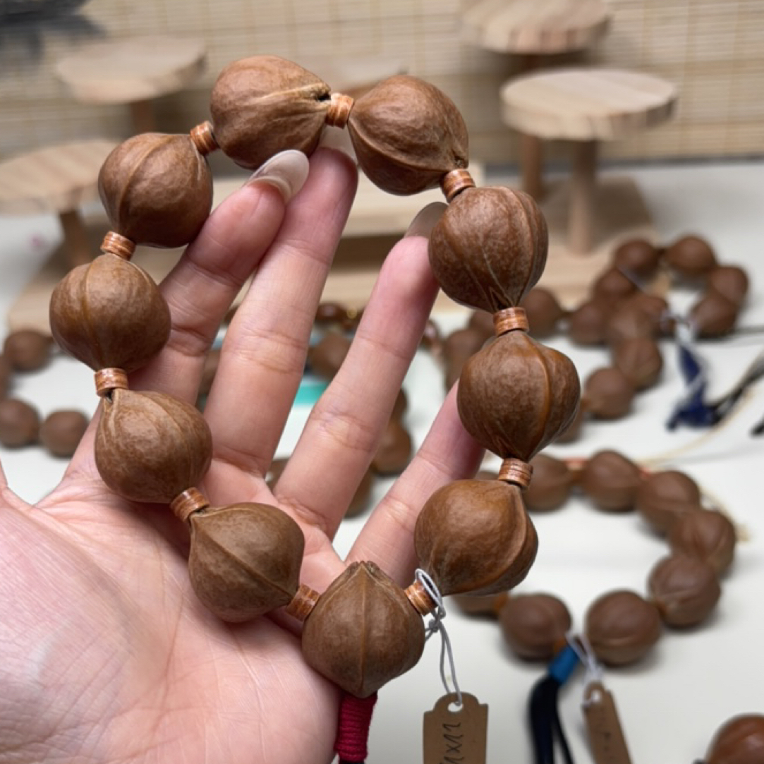 22.25精品梅林铁核橄榄核三花大籽