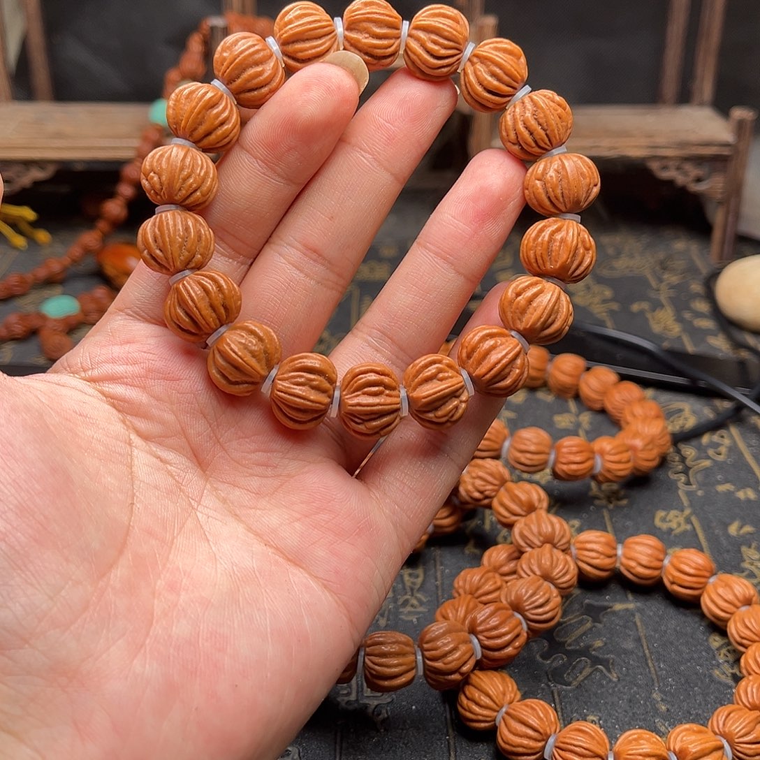 吊坠桃核佛手手串