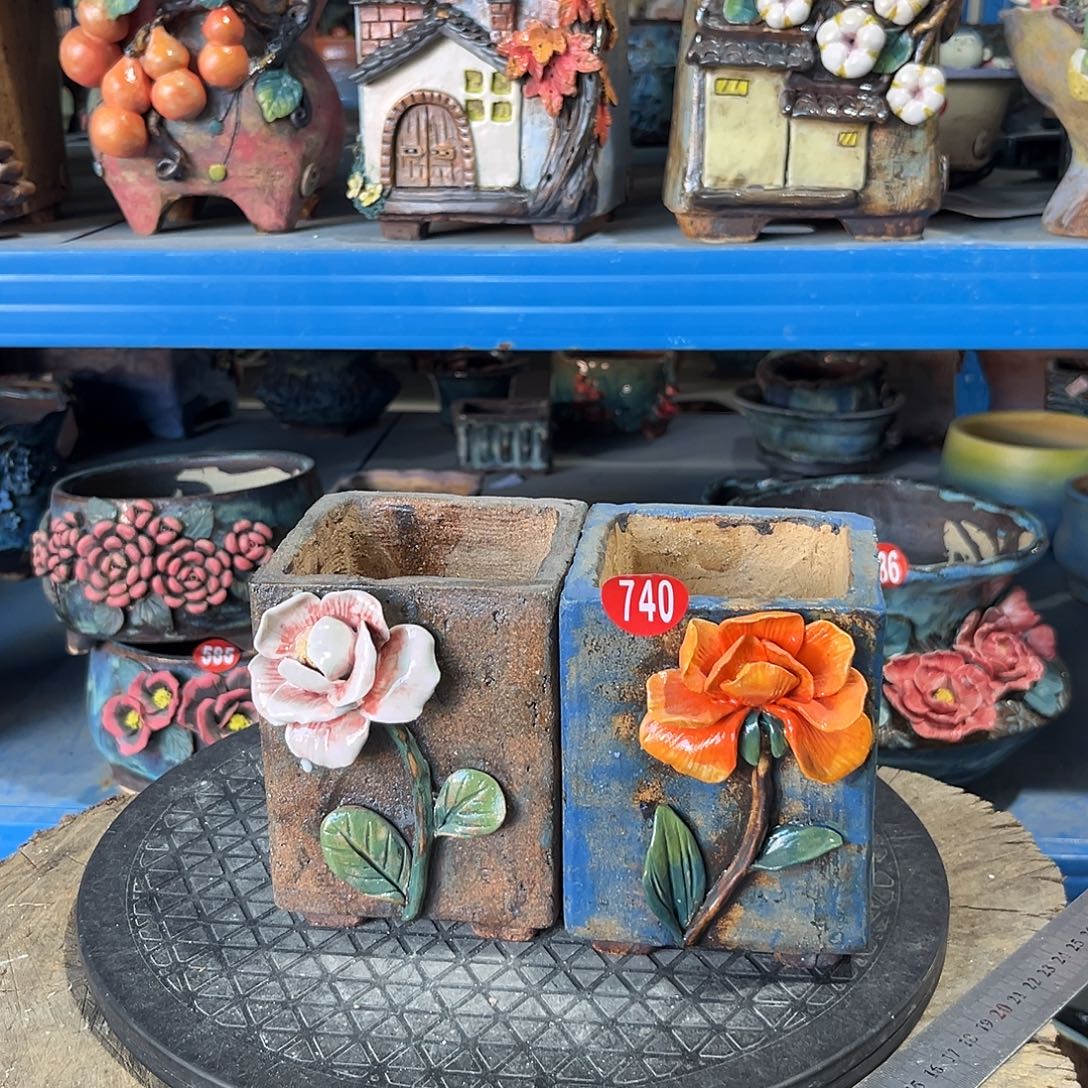 谈***首微瑕740 号陶然花器手工花盆