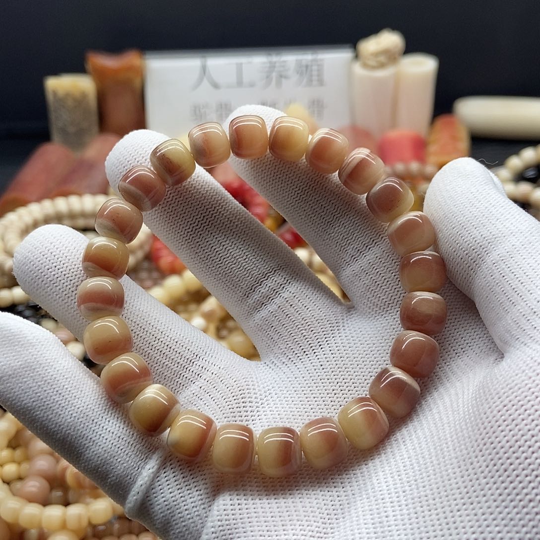 驼骨手串/手链姗****?10毫米驼骨三花