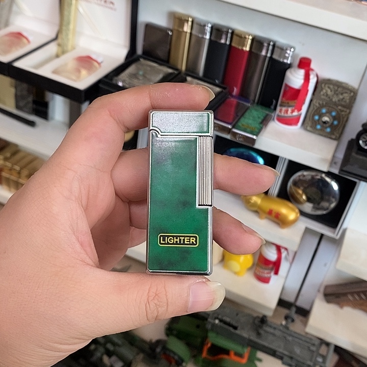 嘿***嘿绿色侧轮充气打火机