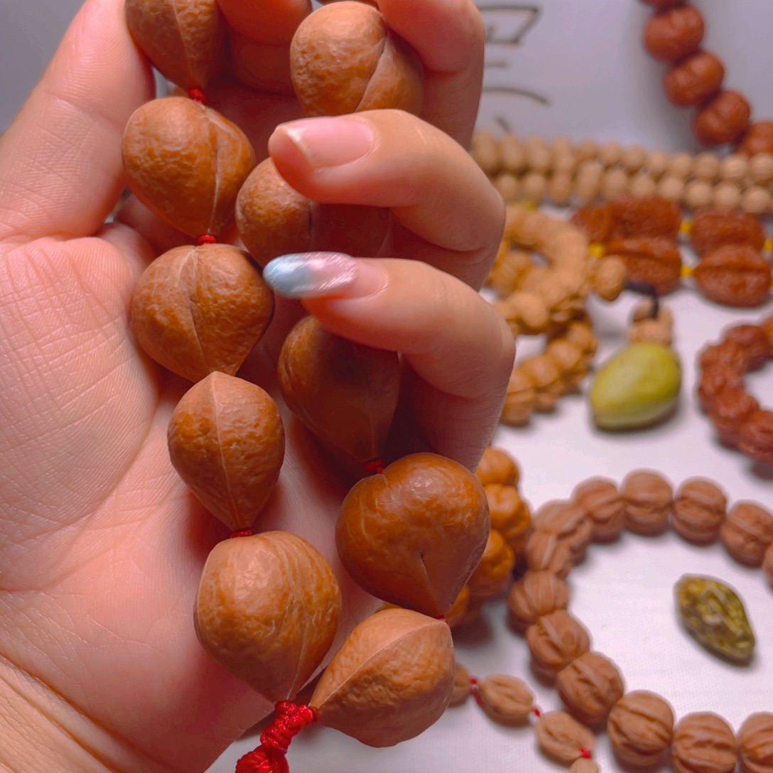 你***了文玩核桃手串屁桃