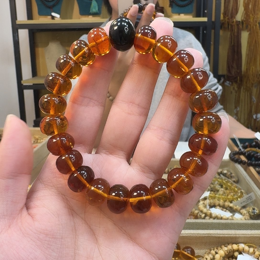 小***龙琥珀未镶嵌裸石抚顺琥珀12mm豆油红