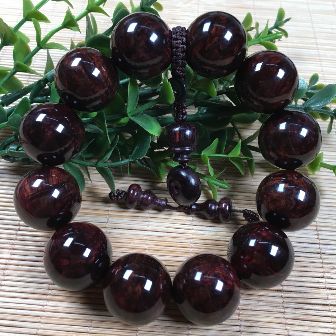 海南黄花梨2.0秒沉水瘤疤水波老料紫油梨高端文玩手串53克