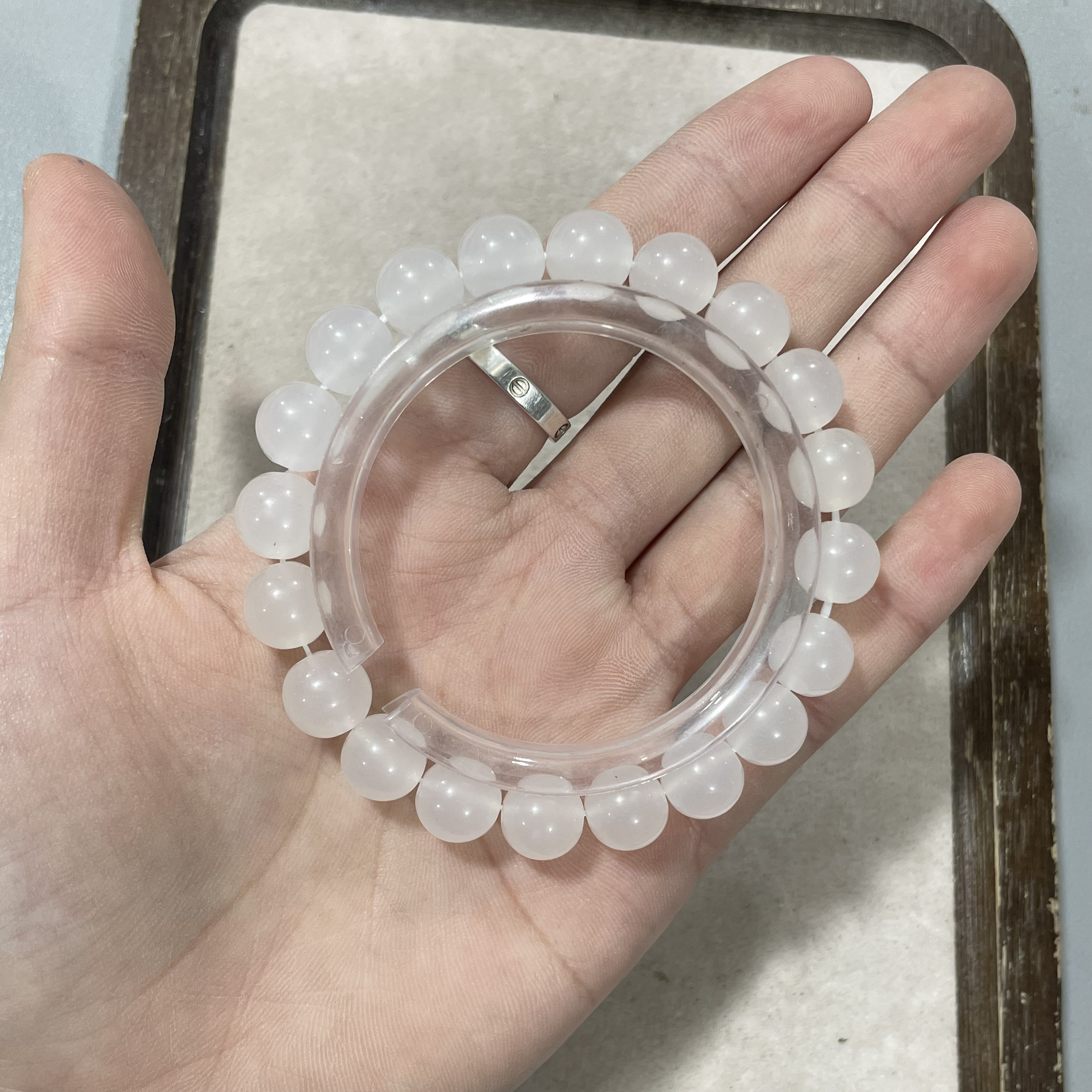 A308海云母（血沉宝）卡1.0单圈手串（紫光线太阳光照射变色）