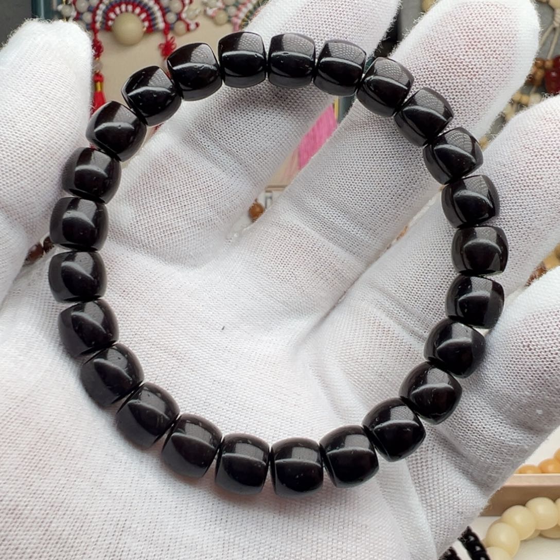 于***青菩提根/象牙果手串卡9 黑金椰蒂S666