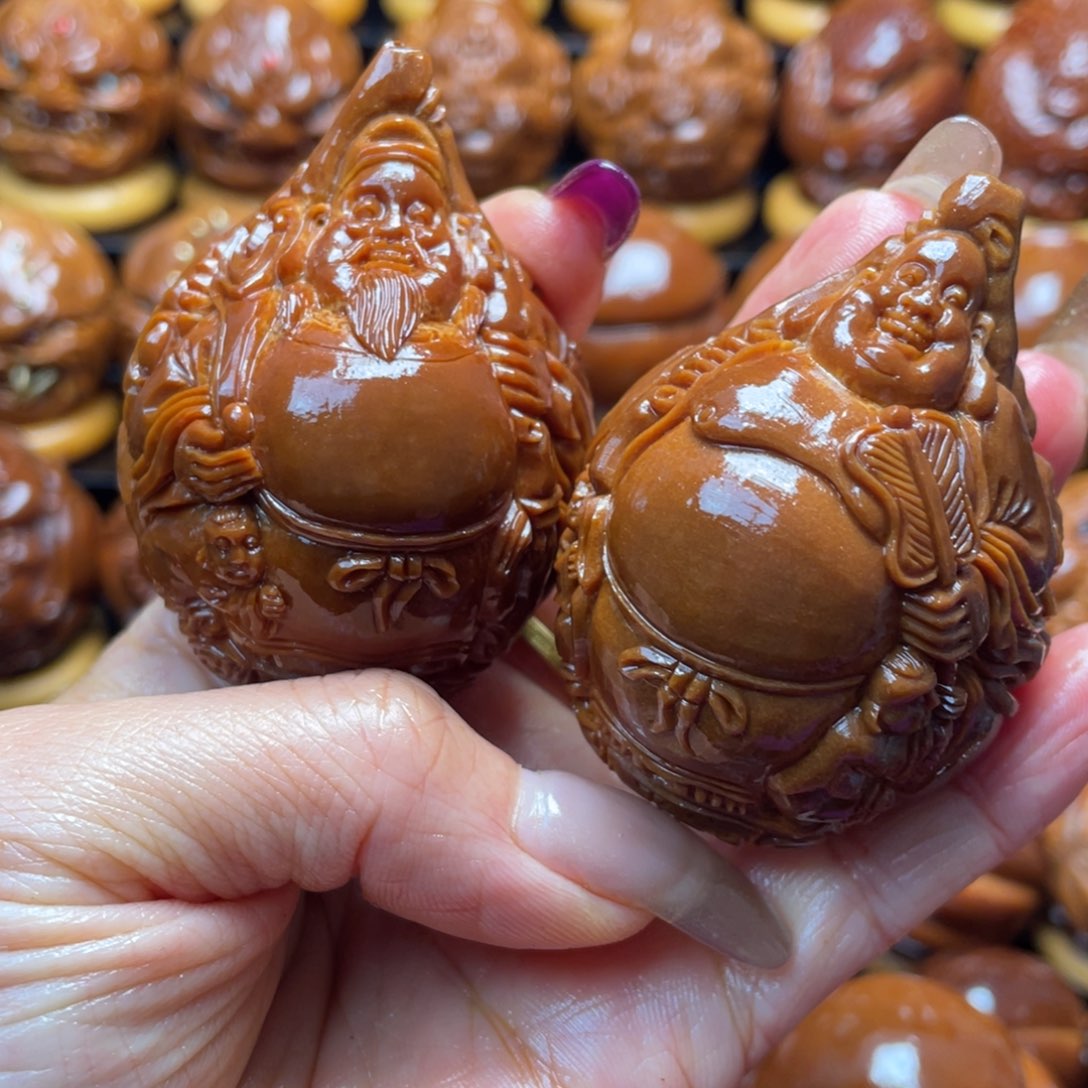 古***人橄榄核把件橄榄球