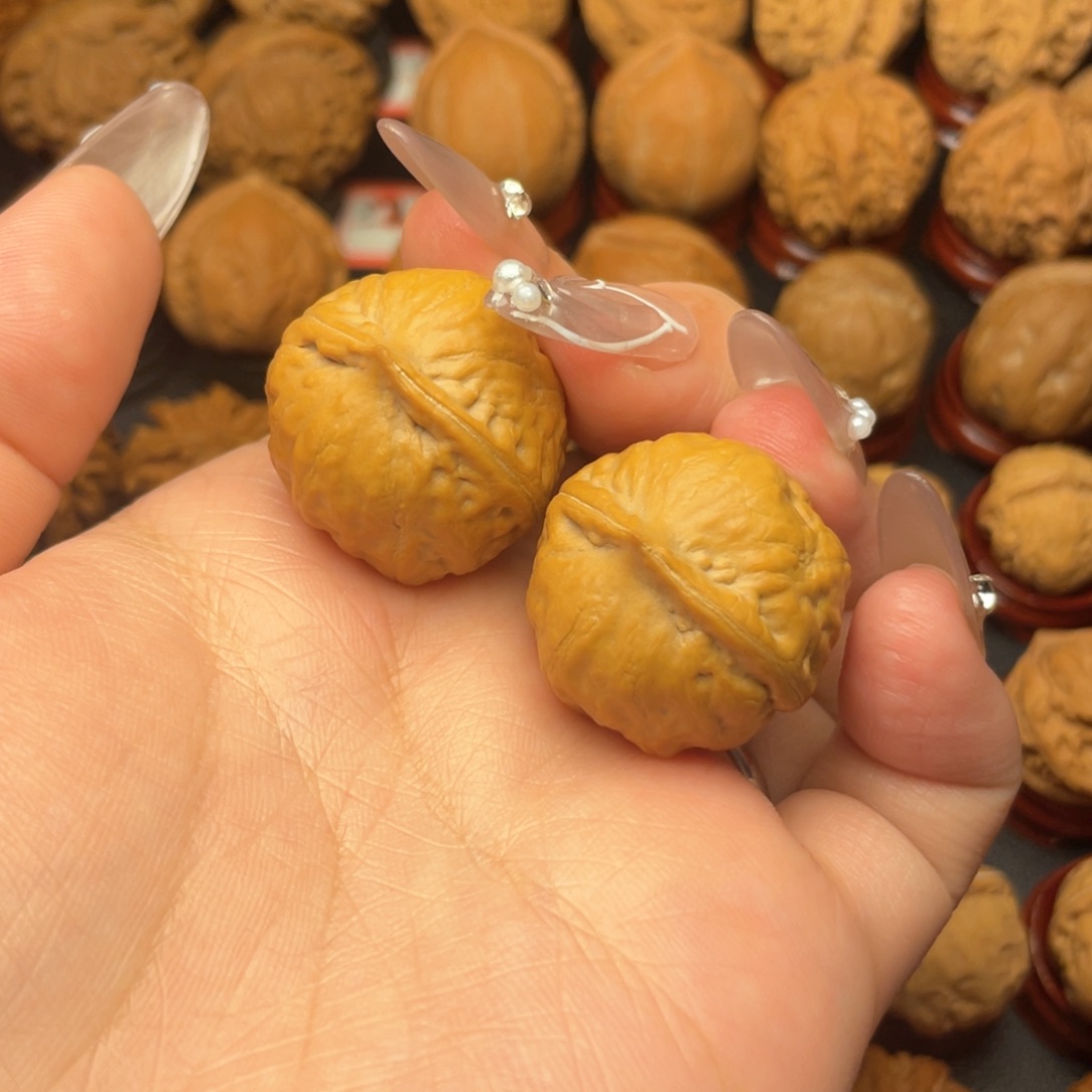 文玩核桃把件萍****?核桃