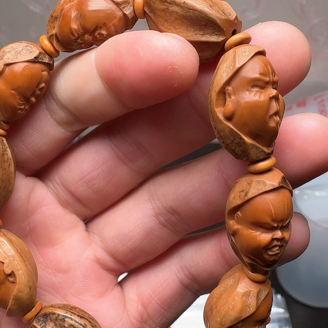 橄榄核手串哥几个