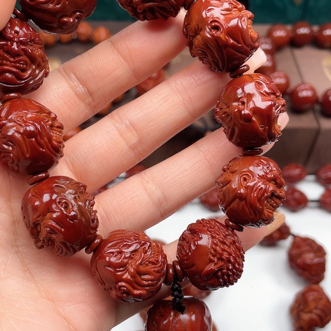 橄榄核手串欧****荐恶僧手串