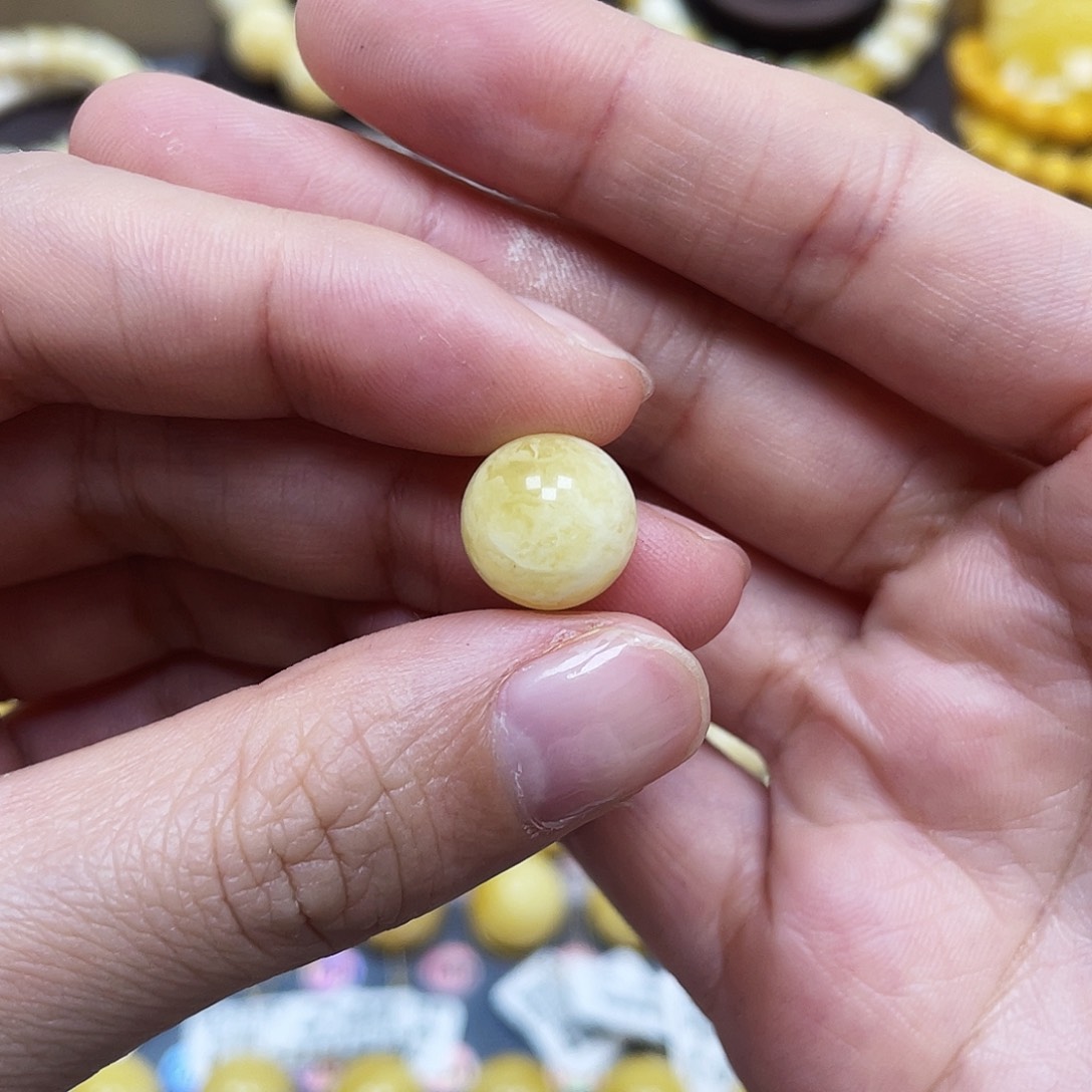 琥珀珠宝奇石未镶嵌11.7mm微瑕平头花粉