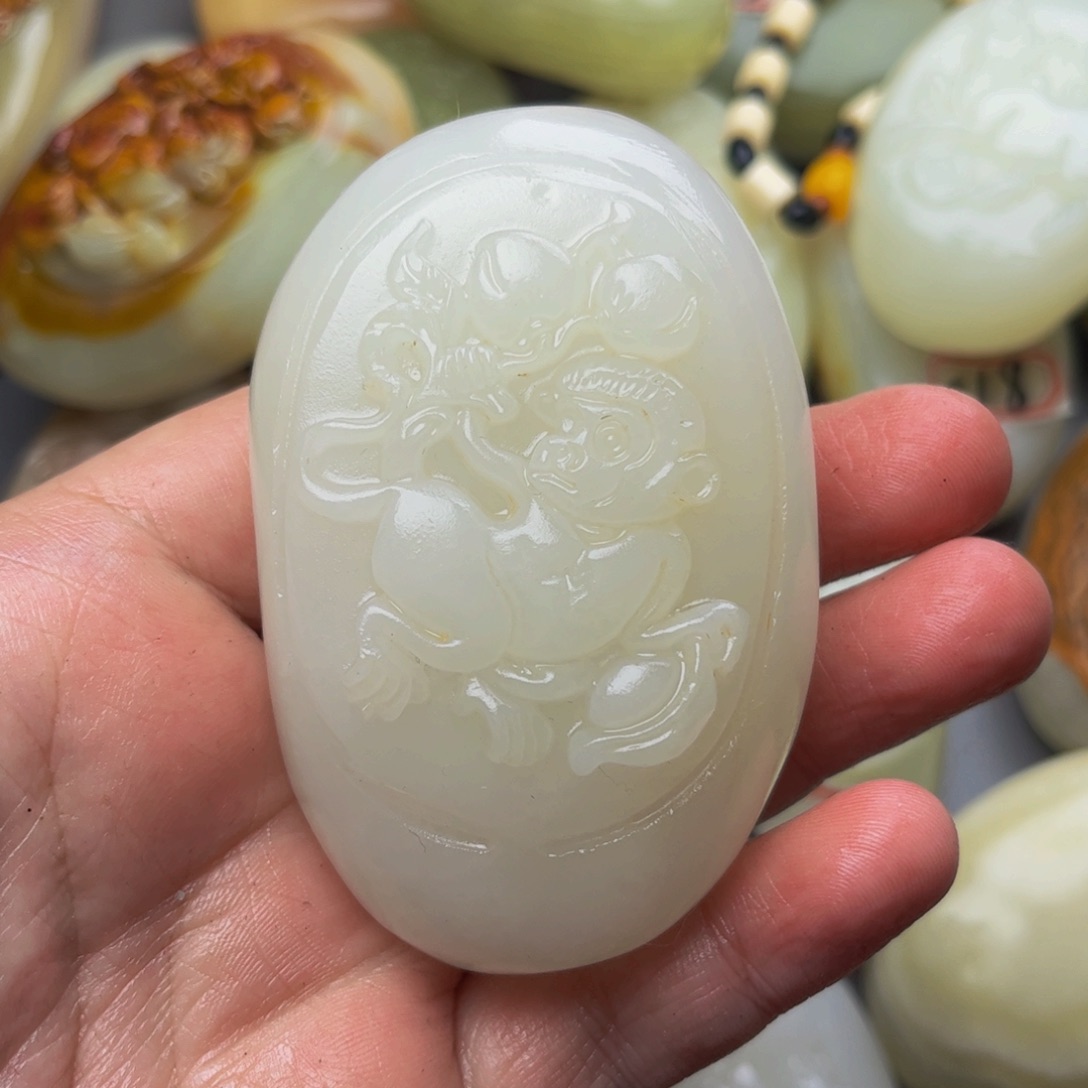 江***傍石材方解石手把件猴