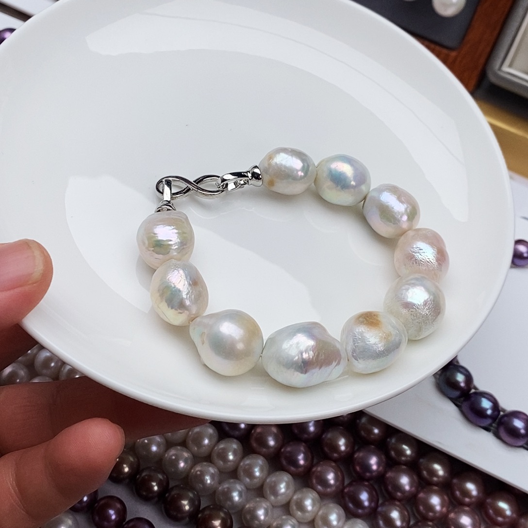 淡水珍珠银S925镶嵌耳饰
