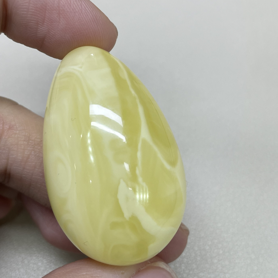 天然原矿蜜蜡浓白蜡妖花水滴吊坠
