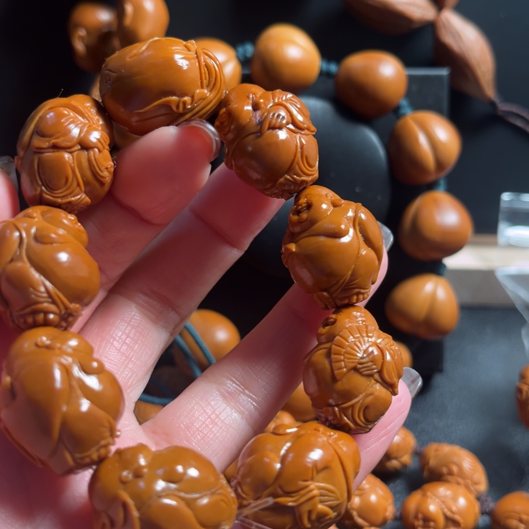 大***伟橄榄核吊坠米勒18