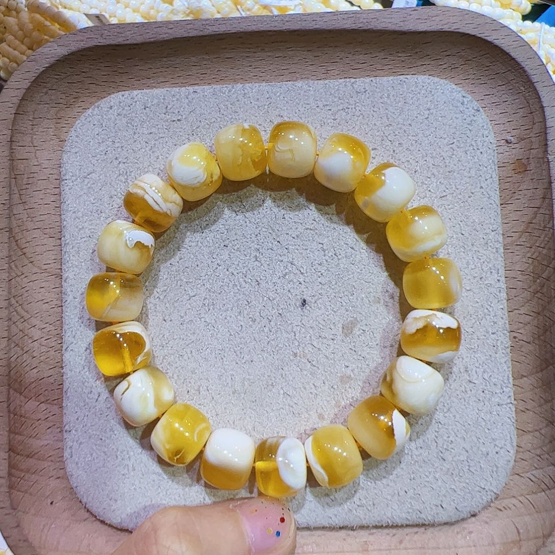 蒙***人琥珀未镶嵌手链19.75 金瓷白老型手串