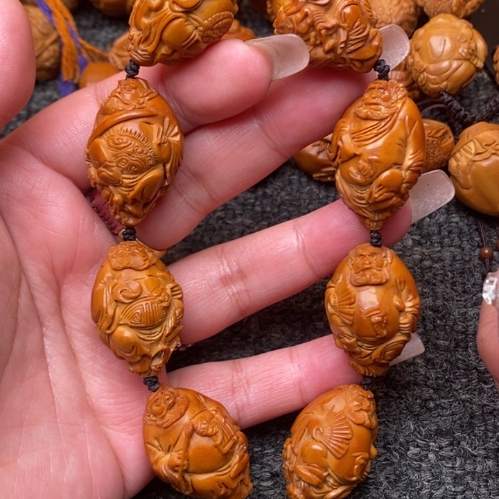 吊坠橄榄核啦经济干净利落健健康康